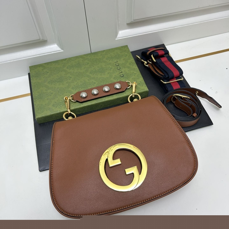 G*u*i top handle bags